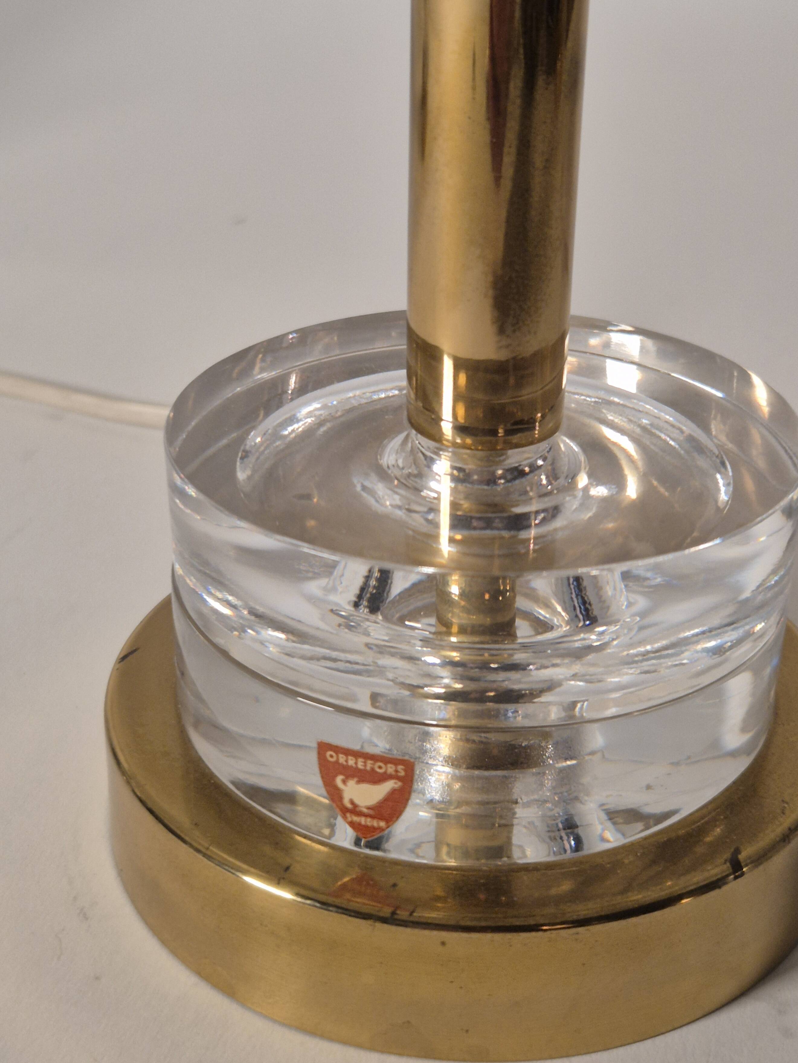 Timeless pair of Scandinavian Modern table lamps with Orrefors glass and brass