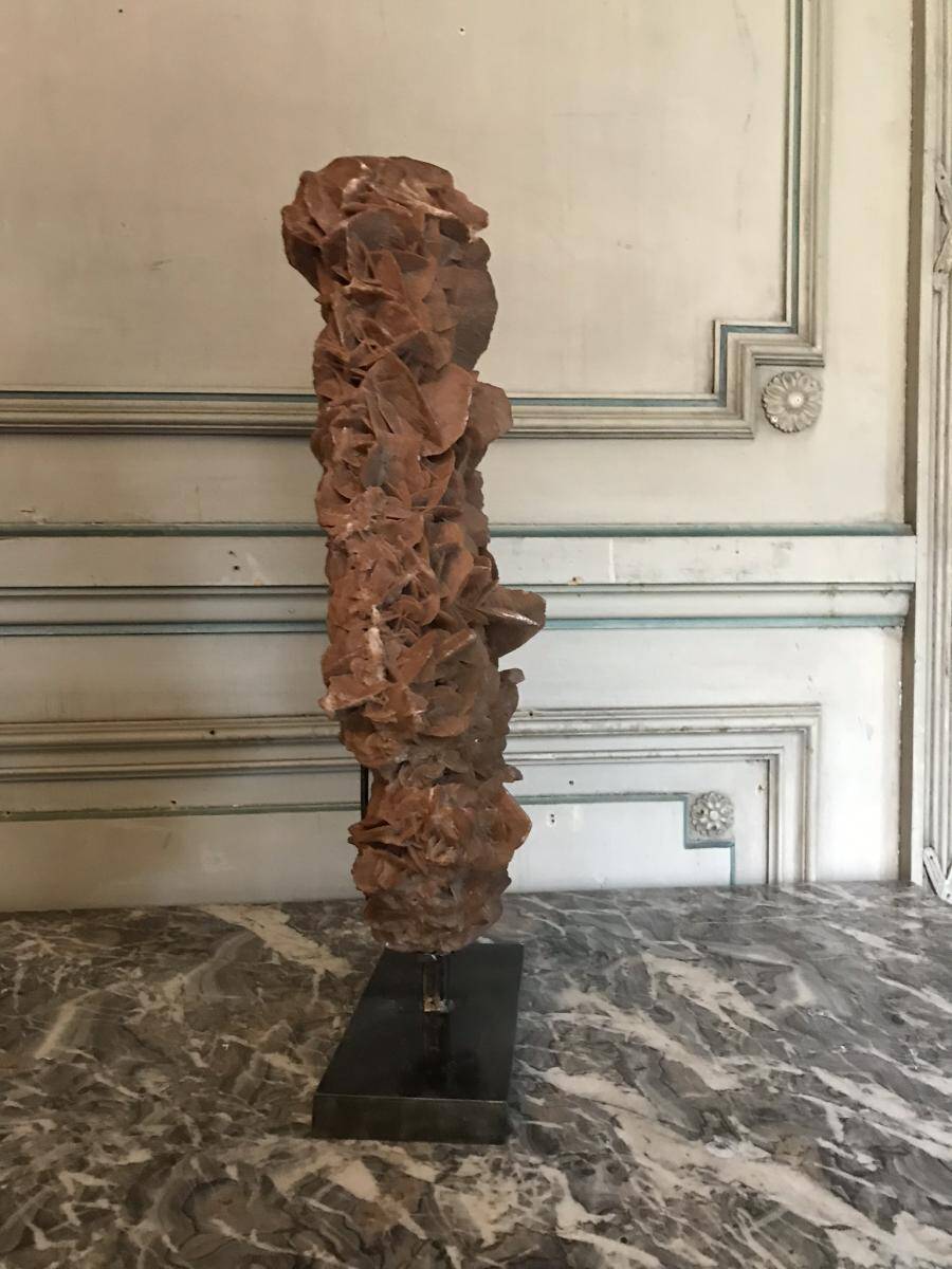 Sandy rose with a base