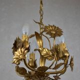 golden chandeliers with flowers.