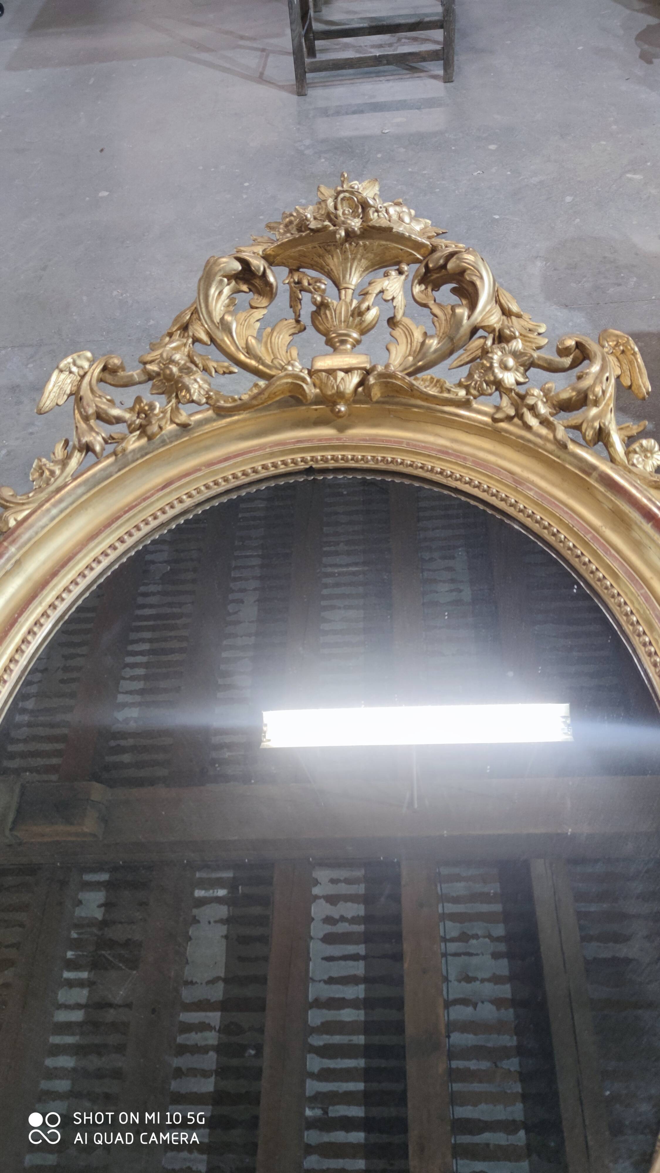 Mirror with a gilt medallion pediment, 1840