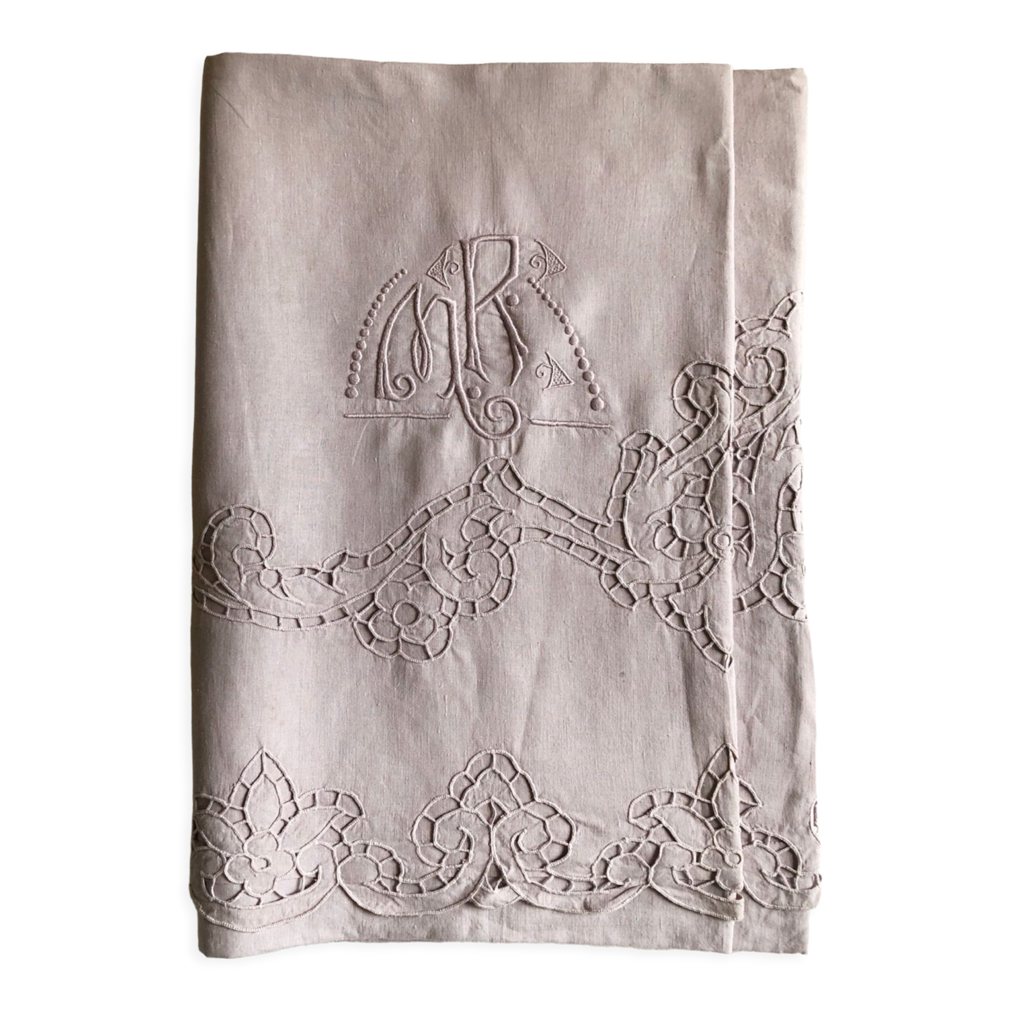 Old embroidered towel tinted purple aurora