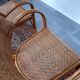 Pair of armchairs in braided rattan 70s