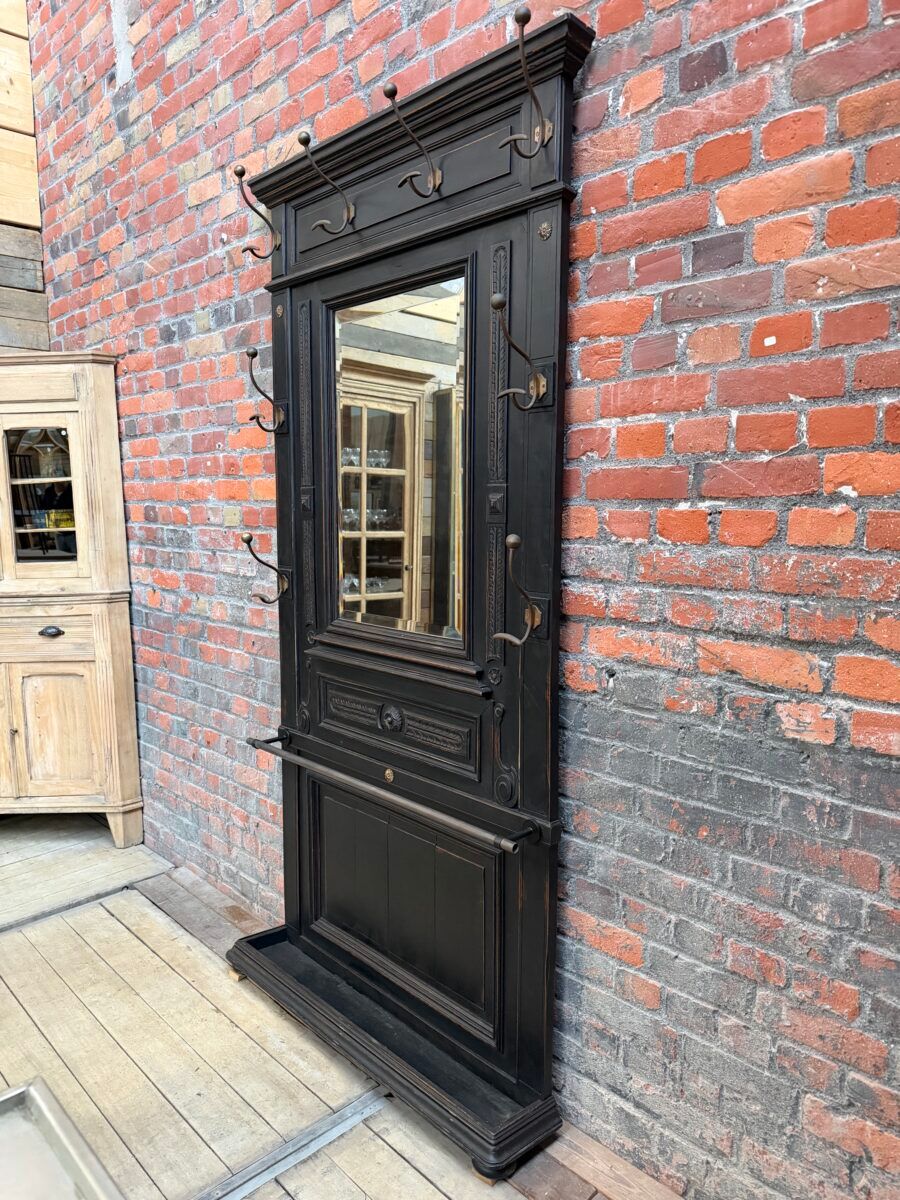 Patinated oak wardrobe from the early 20th century.