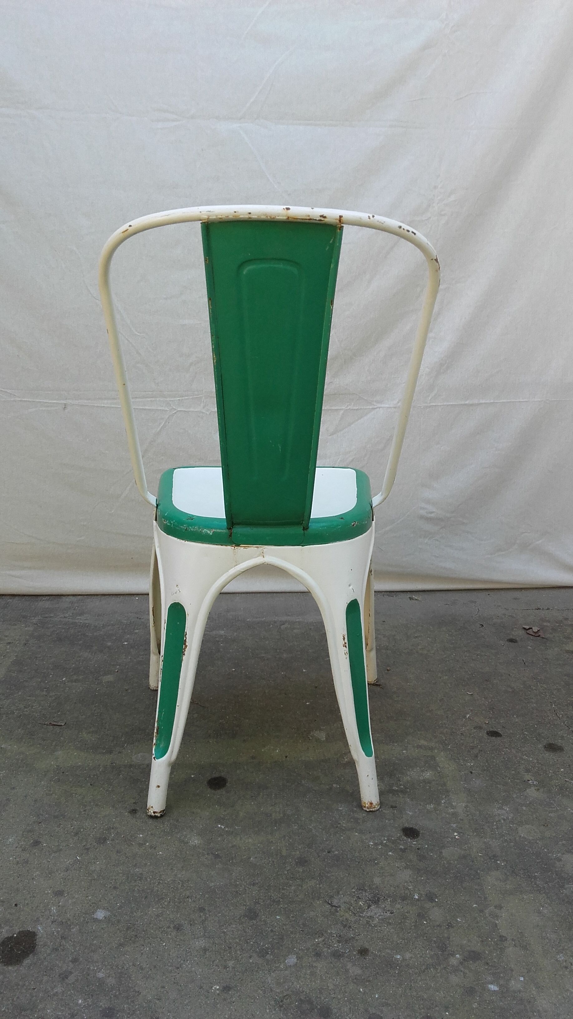 Four old Tolix Model A chairs