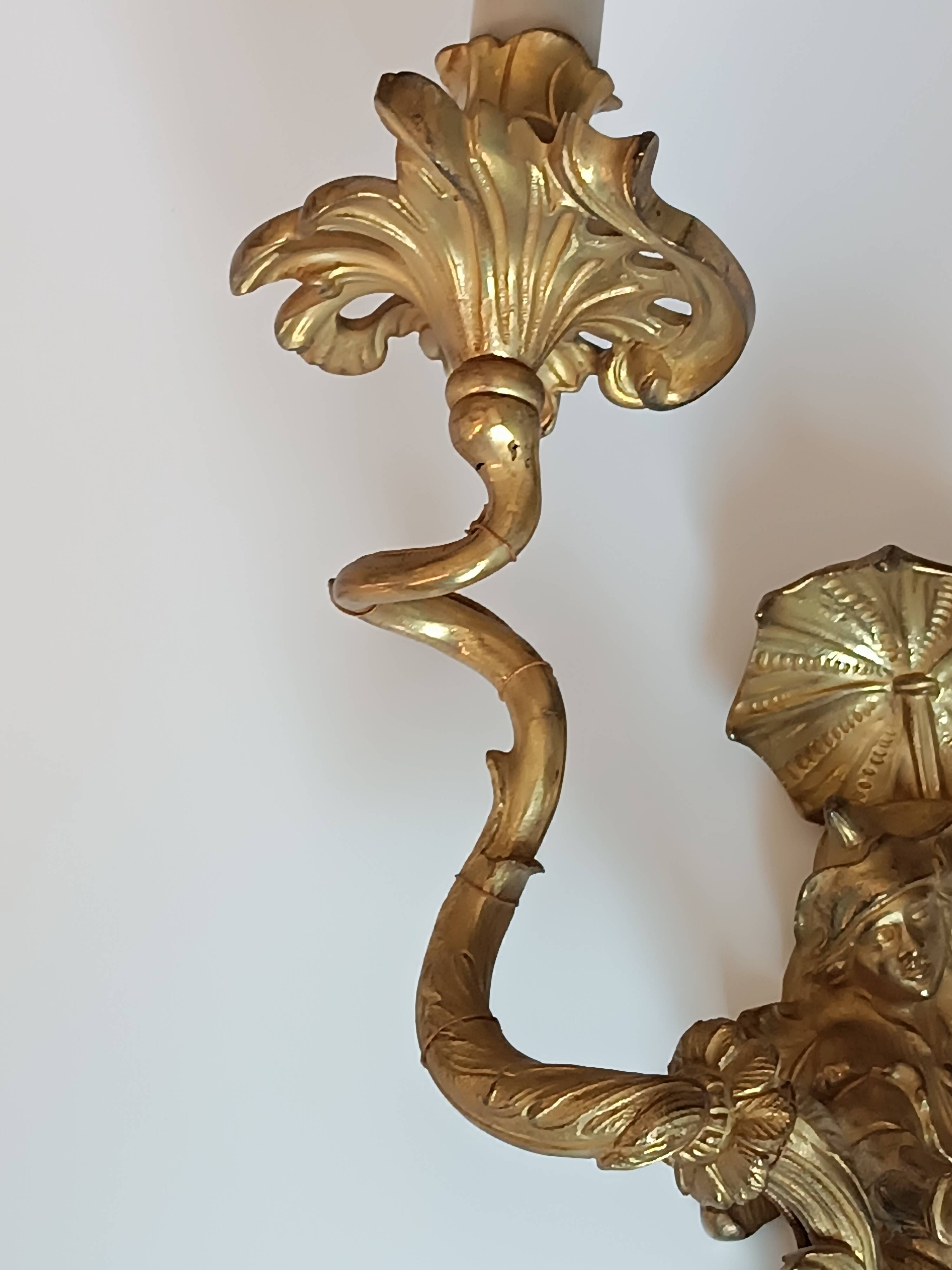 Pair of Regency style gilt bronze wall lights
