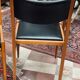 2 Scandinavian-style natural wood chairs, black trim