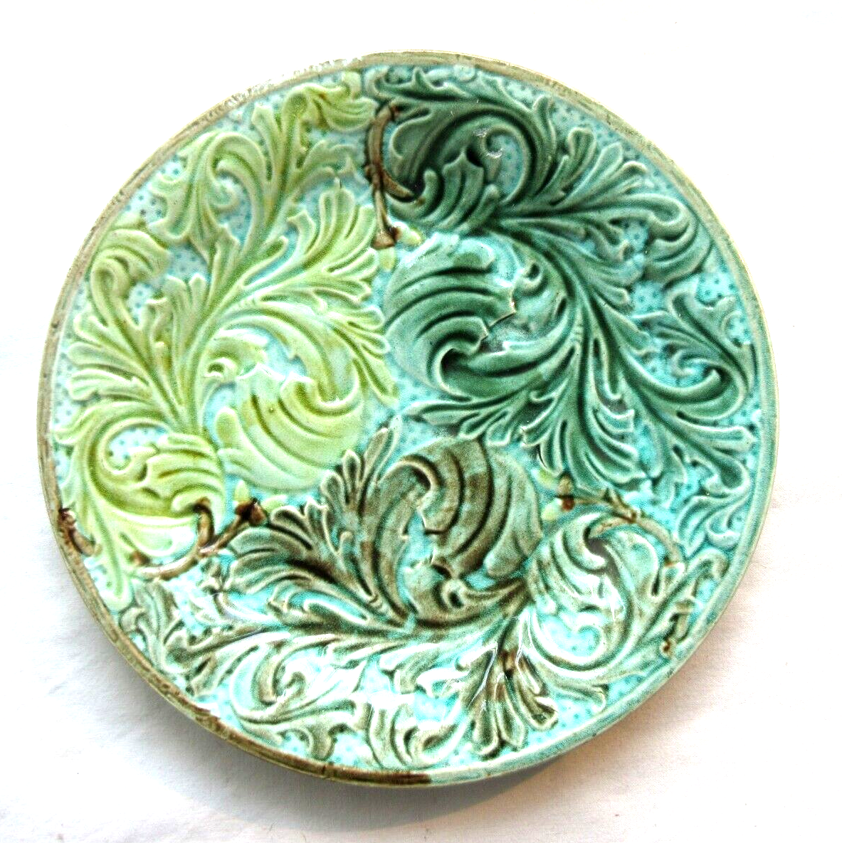 Old dessert plate in slip: Acanthus leaves, Sarreguemines