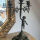 Set of 3 antique three-branch candelabras with cherubs and bronze patina.