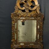 Miroir Régence à parcloses en bois sculpté doré 39 x 65 cm