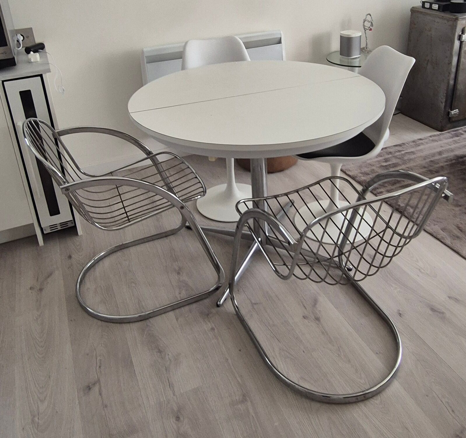 A pair of space age wire chairs