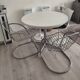 A pair of space age wire chairs