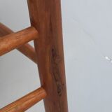 Pair of wooden chairs with seat and straw back