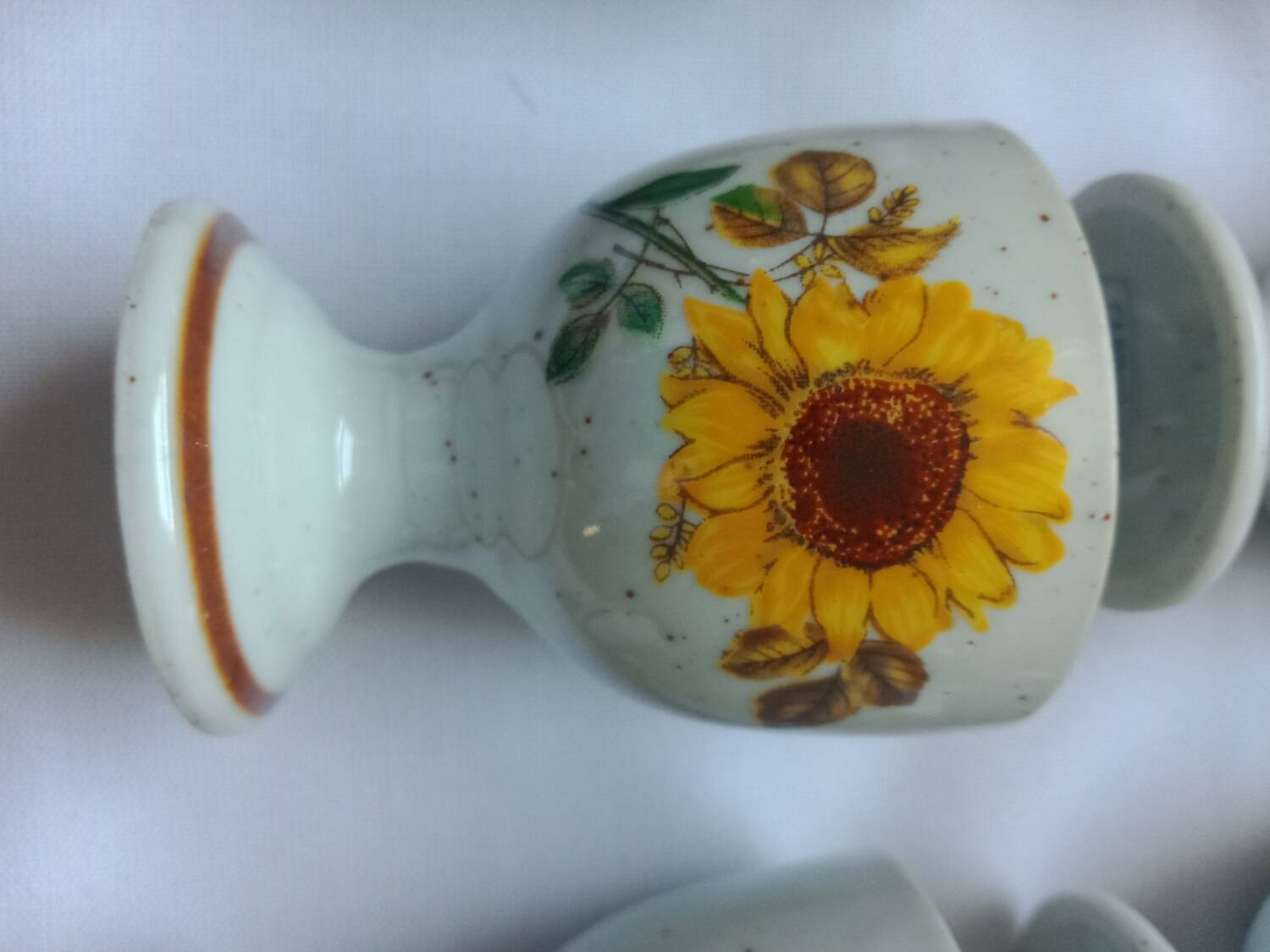 Stoneware egg cups screen printed with sunflowers