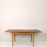 Scandinavian table with sliding shelves
