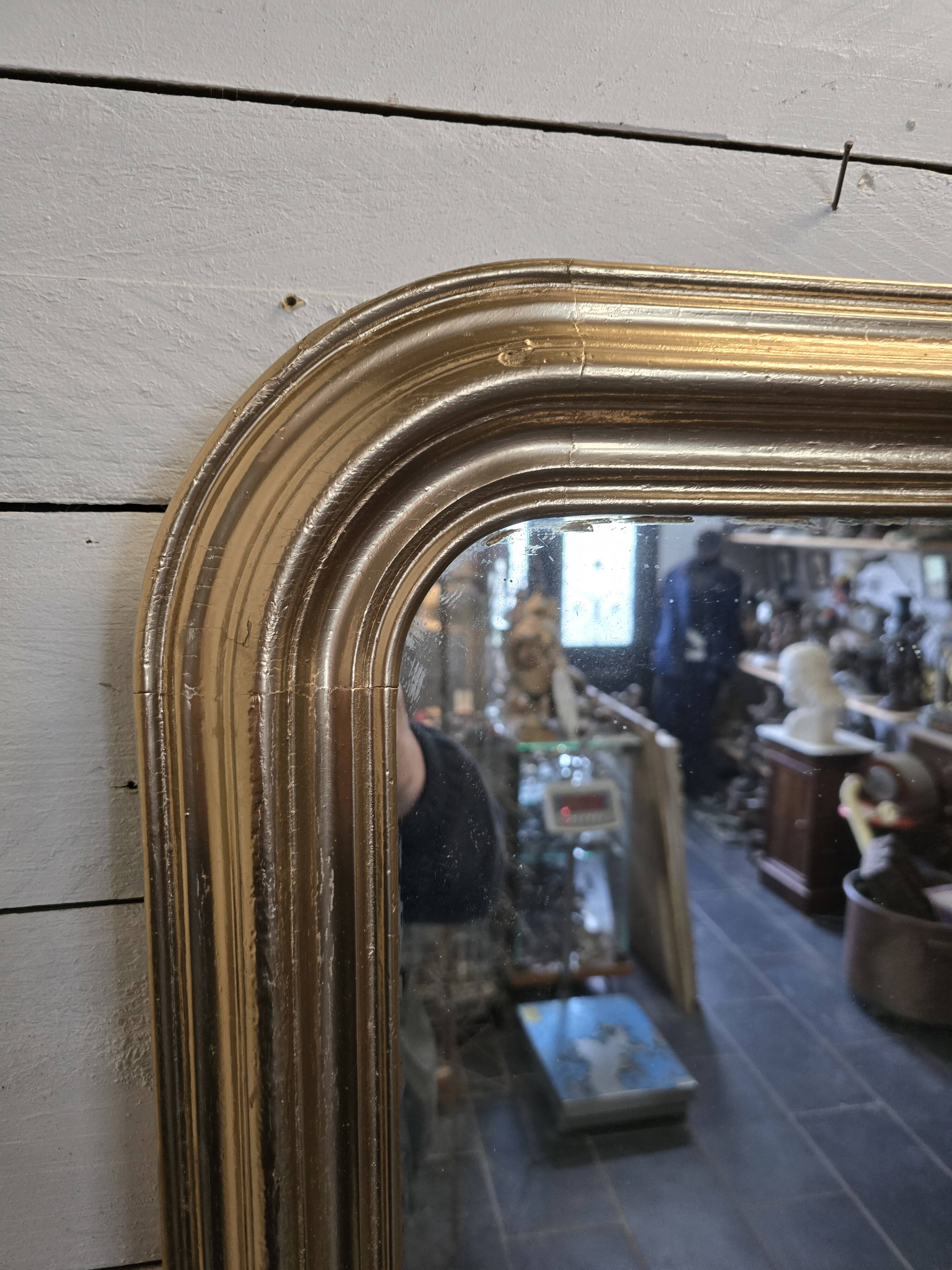 Old Louis Philippe style gilded mirror with mercury mirror