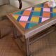 Table basse en bois revisitée - plateau géométrique coloré