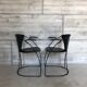 “Armlinda” black leather dining chairs by Arrben Italy