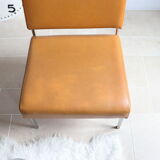 Modernist armchair in chromed metal and imitation leather, 50s/60s
