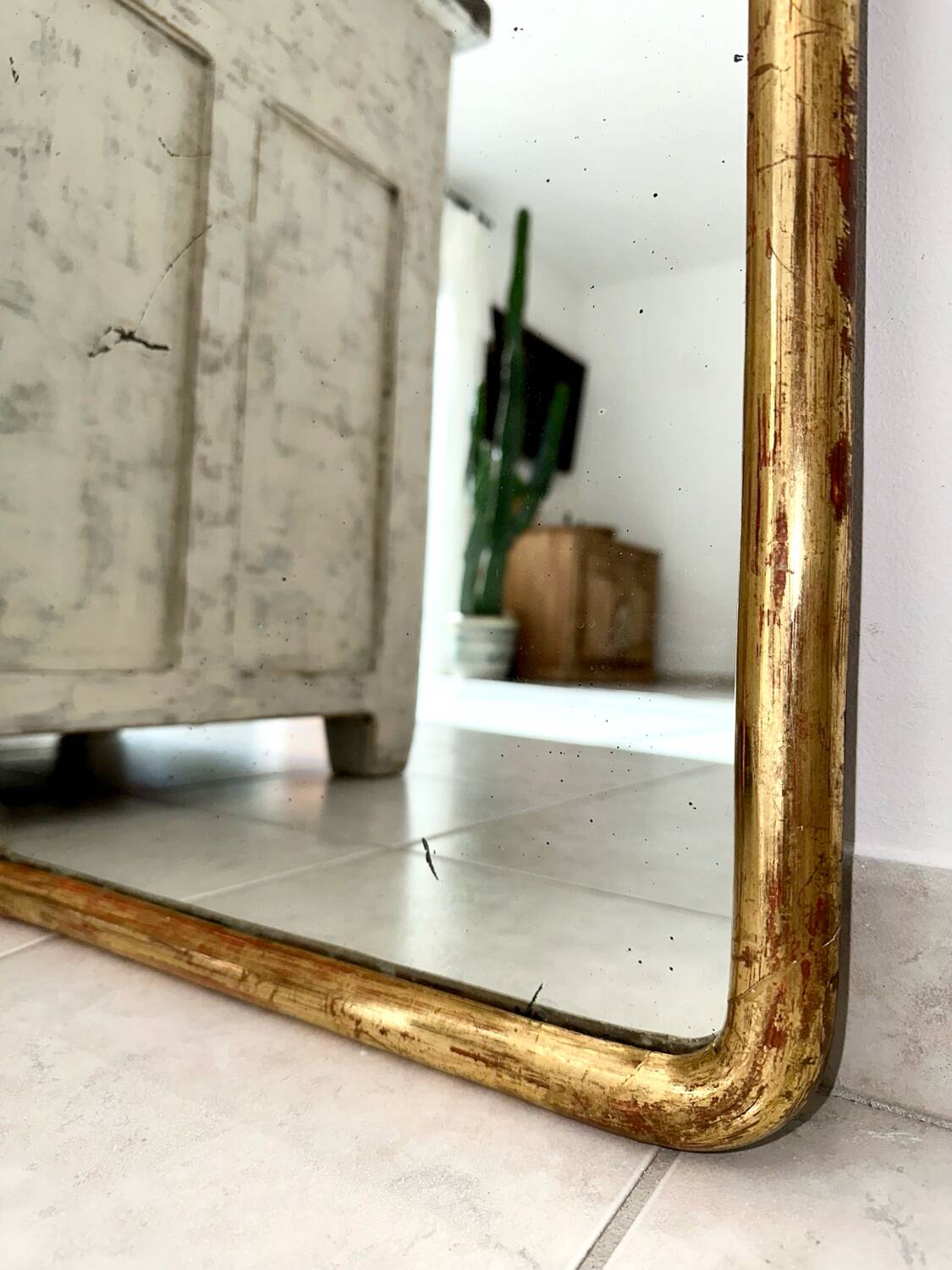 Antique gilded Louis-Philippe mirror, 19th century.