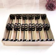 Box of 12 wrought iron cutlery holders