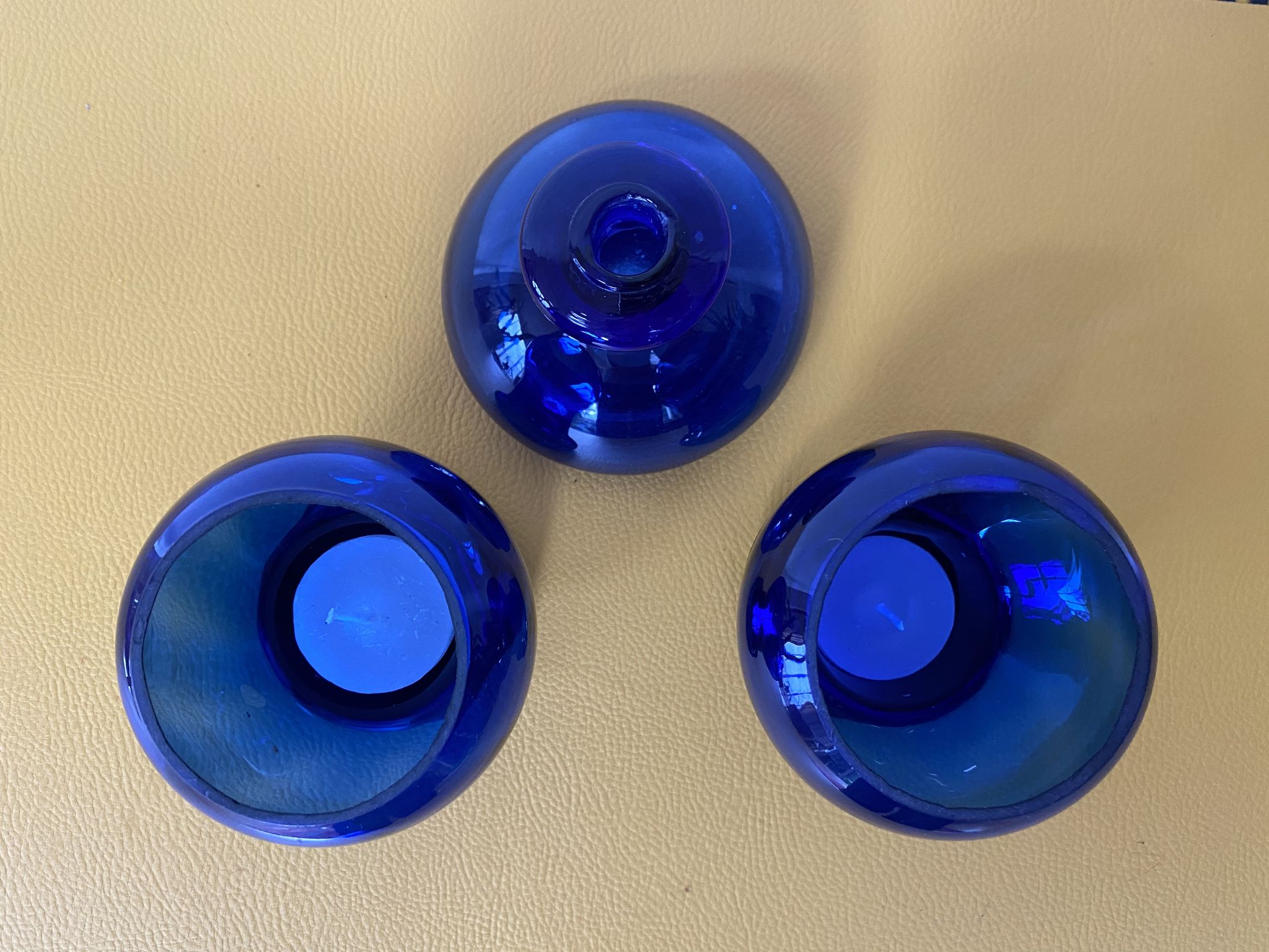 Duo of cobalt blue glass candlestick photophores
