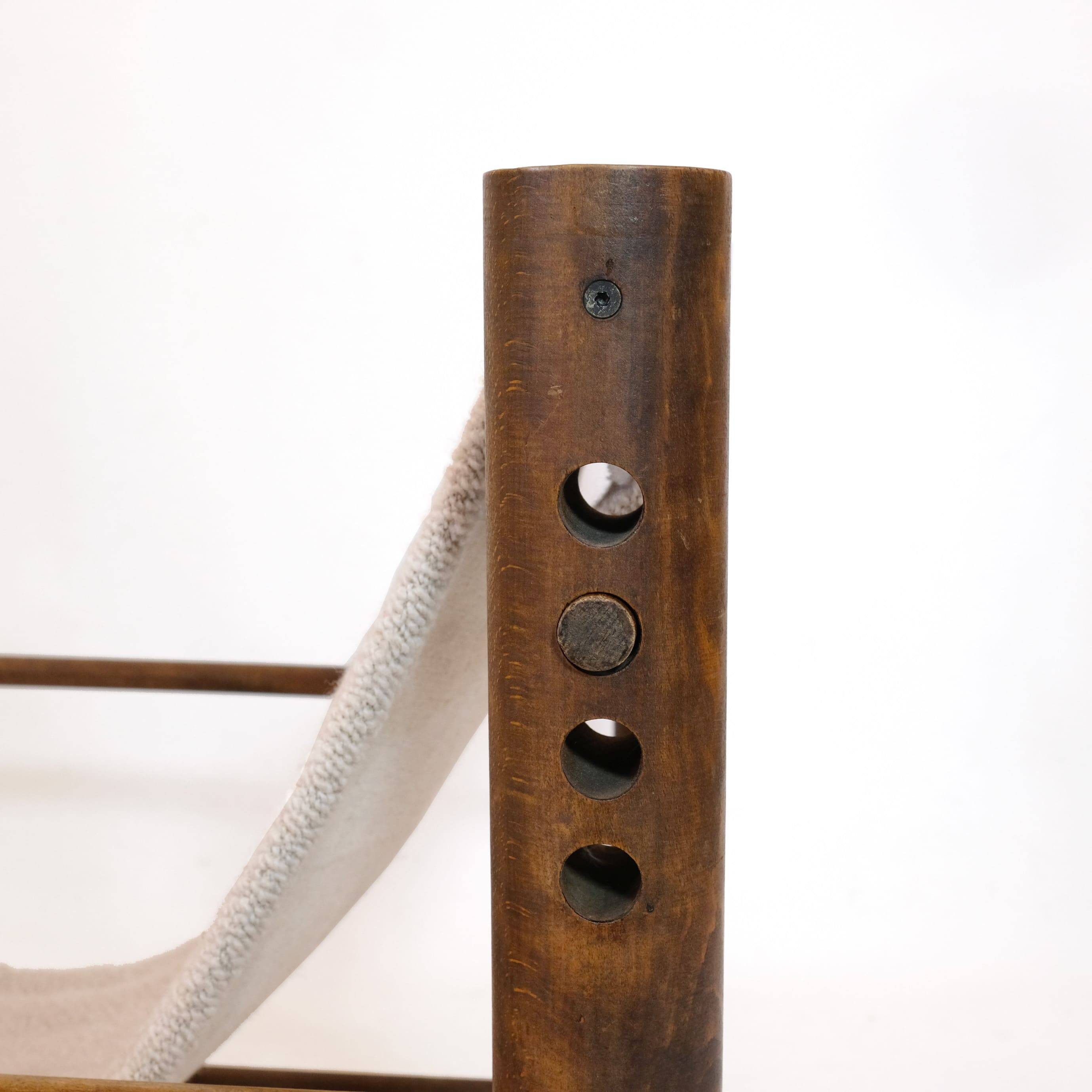 Solid wood armchair with adjustable backrest.