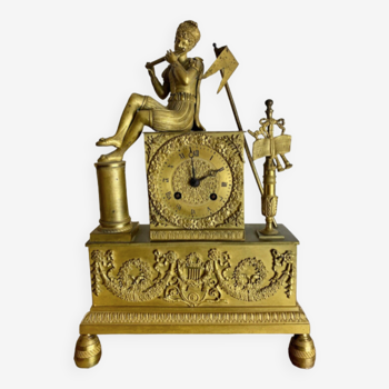 Pendule d'époque restauration XIXe en bronze doré