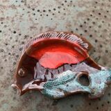 Empty pocket in glazed ceramic slip in the shape of vintage fish