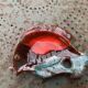 Empty pocket in glazed ceramic slip in the shape of vintage fish