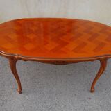 Large oval table in Regency style, extensions under the top.