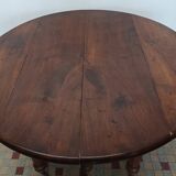 Ancienne table Louis Philippe 6 pieds sur roulettes