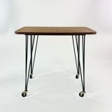 Table on wheels, laminate top and metal Eiffel legs, circa 1950