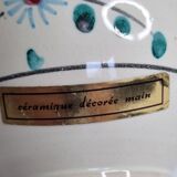 Pair of hand decorated enamelled ceramic vases, 13 cm