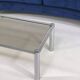 Rectangular coffee table from the 70s in chrome steel and smoked glass top