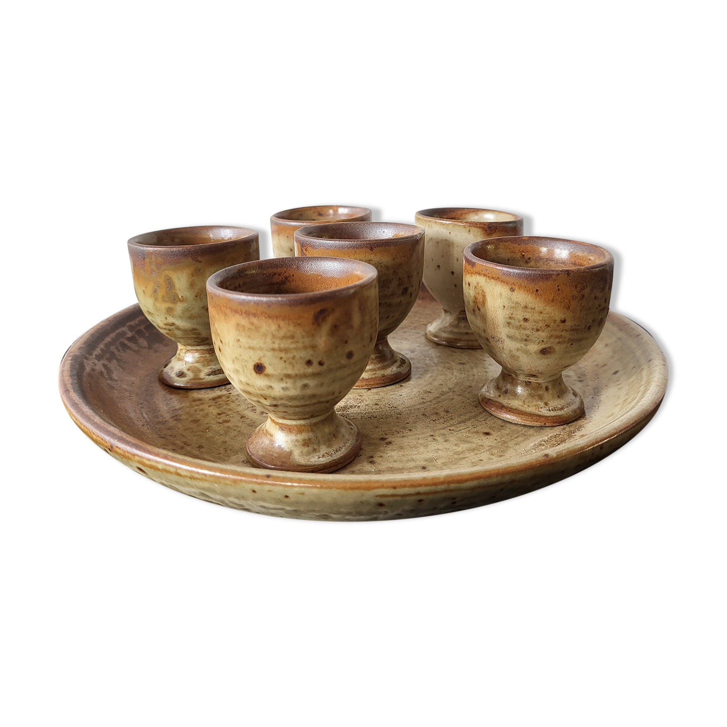 6 whooping coughs on their plate in sandstone