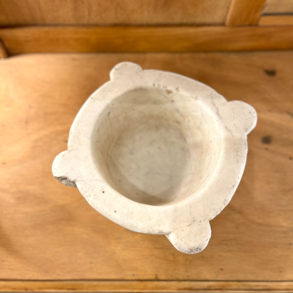 Old white grey marble mortar