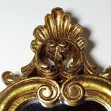 Vintage Rococo wall mirror, gold, Italy, circa 1950-1970, wood and gilded stucco.