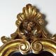 Vintage Rococo wall mirror, gold, Italy, circa 1950-1970, wood and gilded stucco.