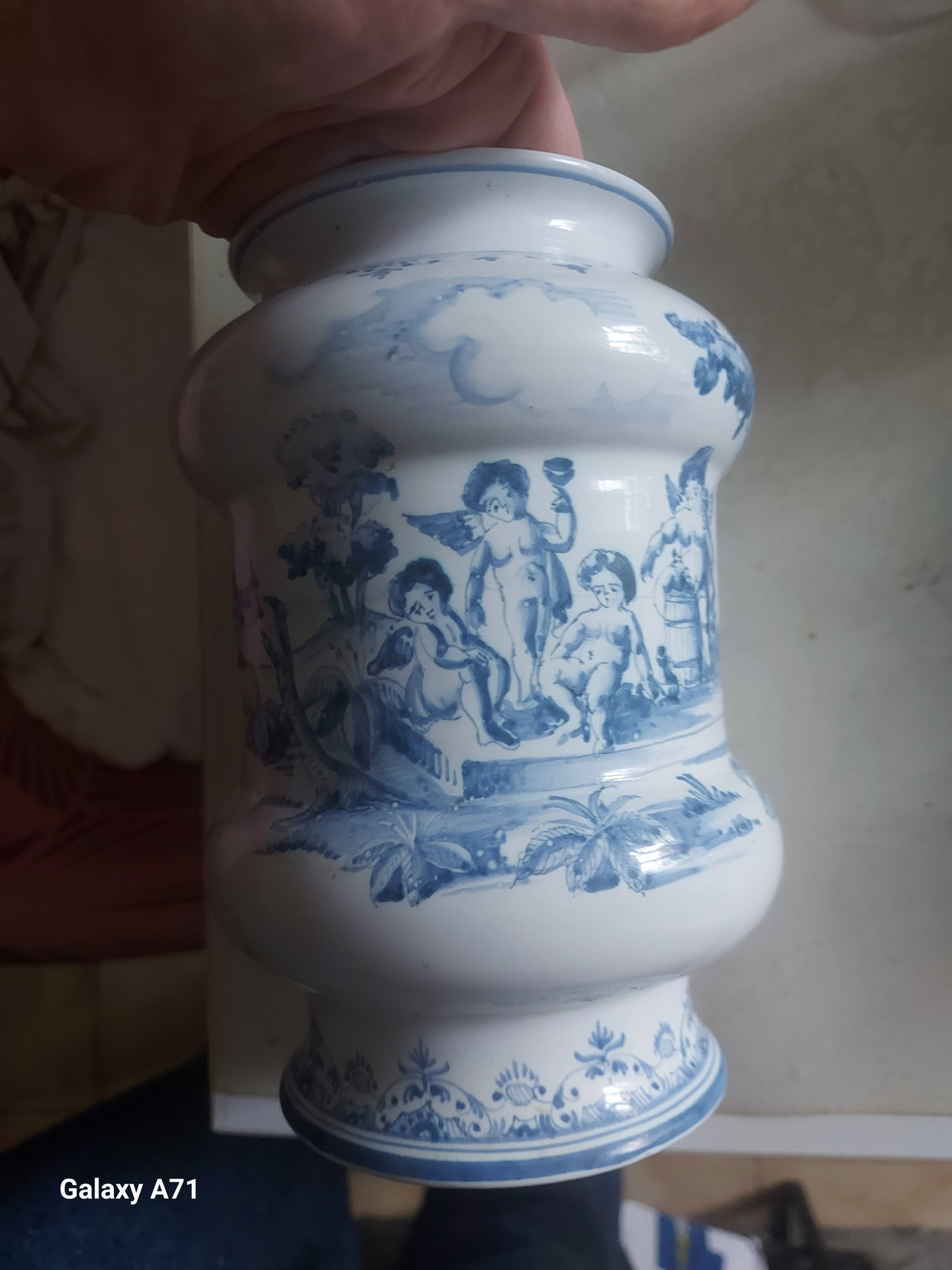 Moustier vase signed