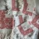 Red and white square sheet 140x140 and 6 towels