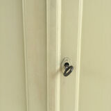 Parisian yellow wooden wardrobe