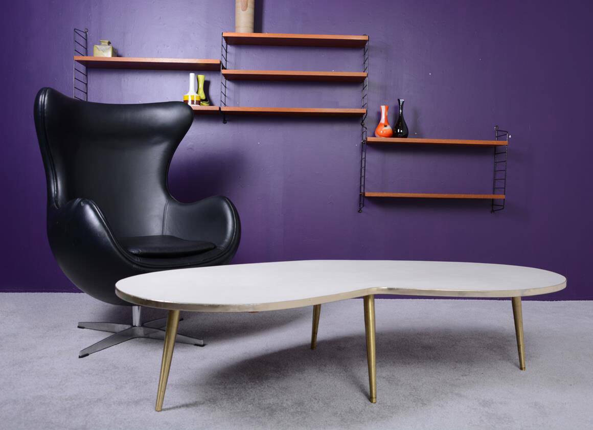 Free-form coffee table dating from the 60s,