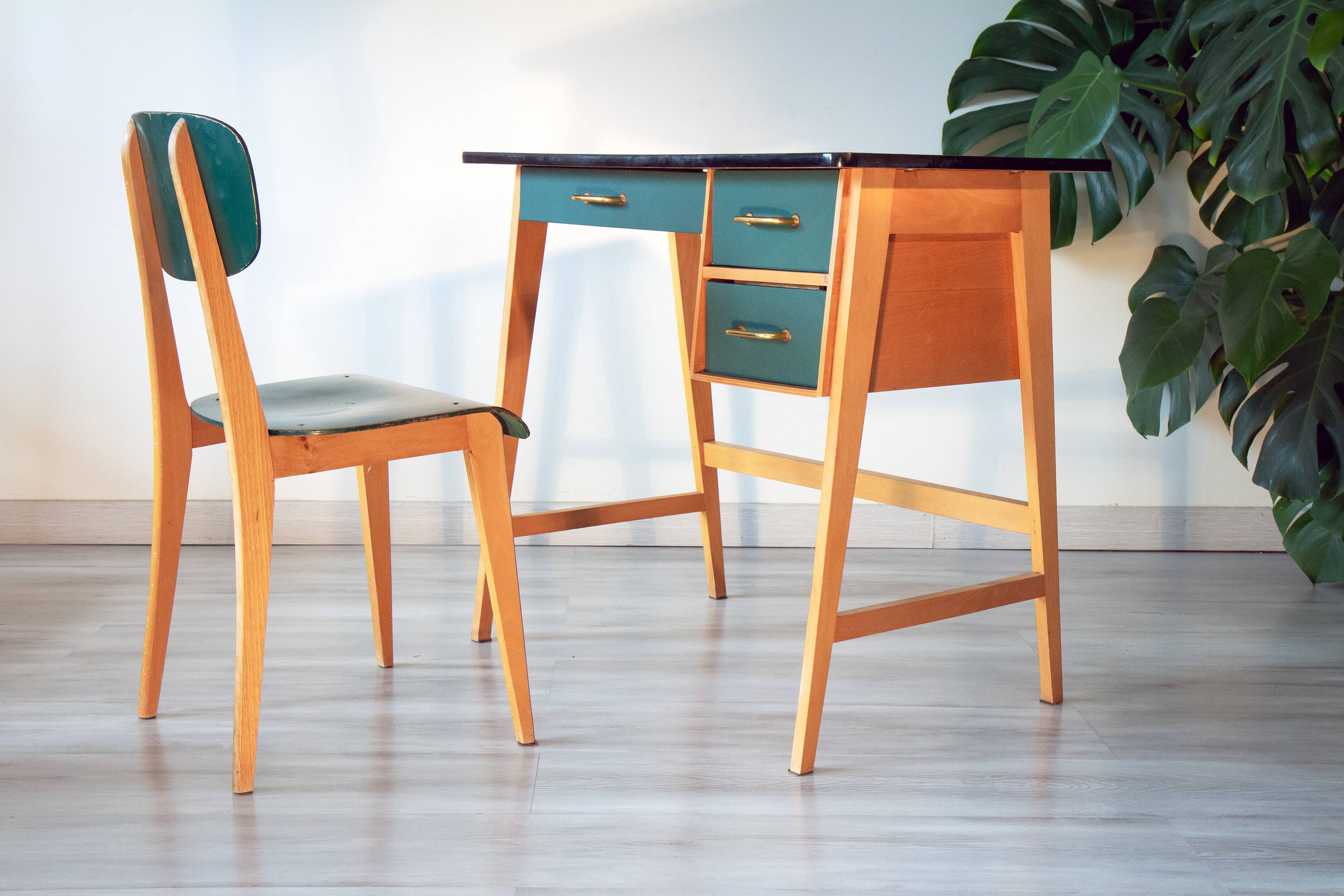 Desk and its green and wood chair, 1950s