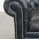 Black cowhide leather chesterfield armchair