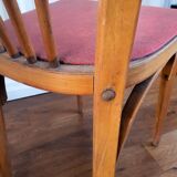 Baumann chair stamped in red skai