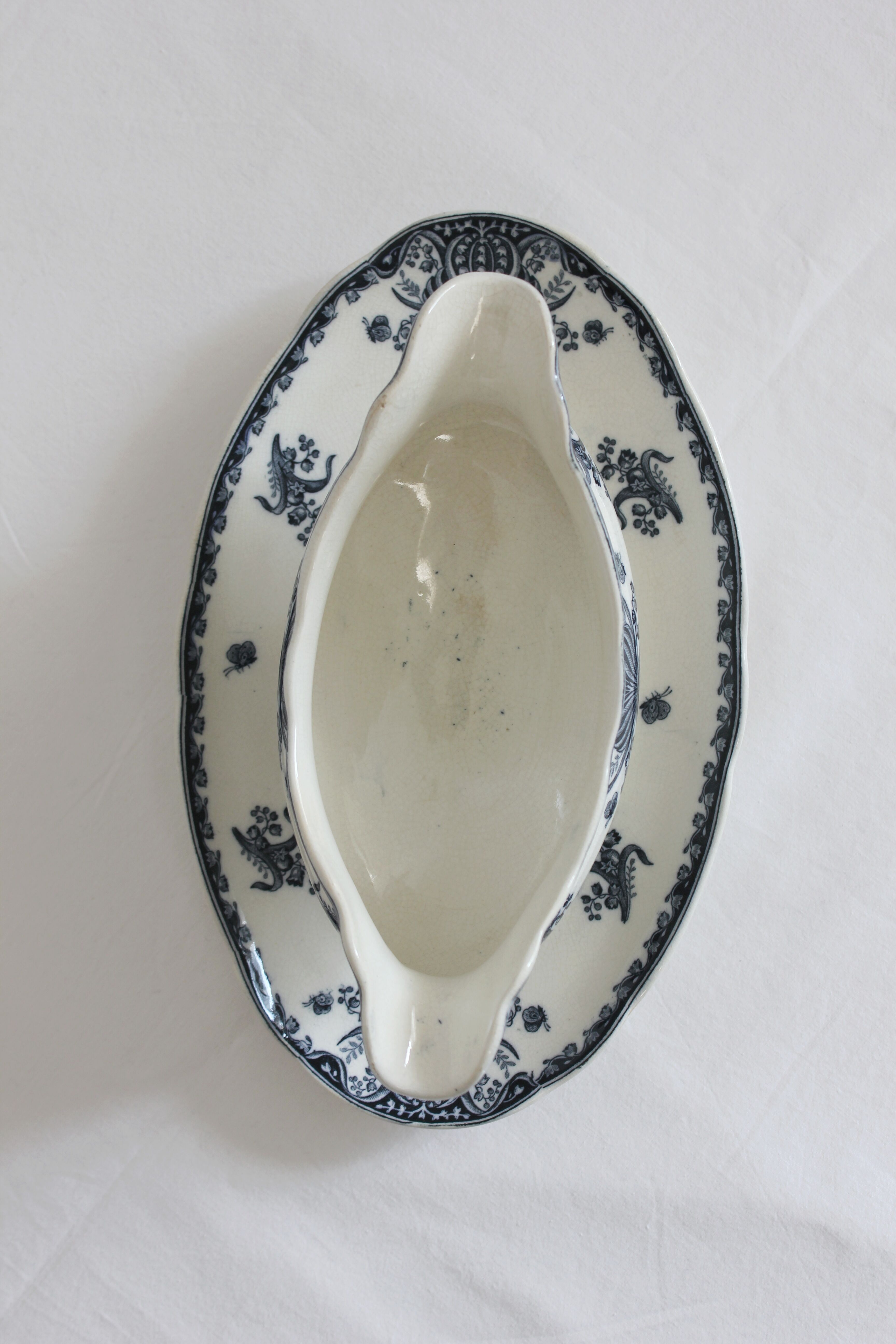 Ironware sauce boat with blue palmette decoration