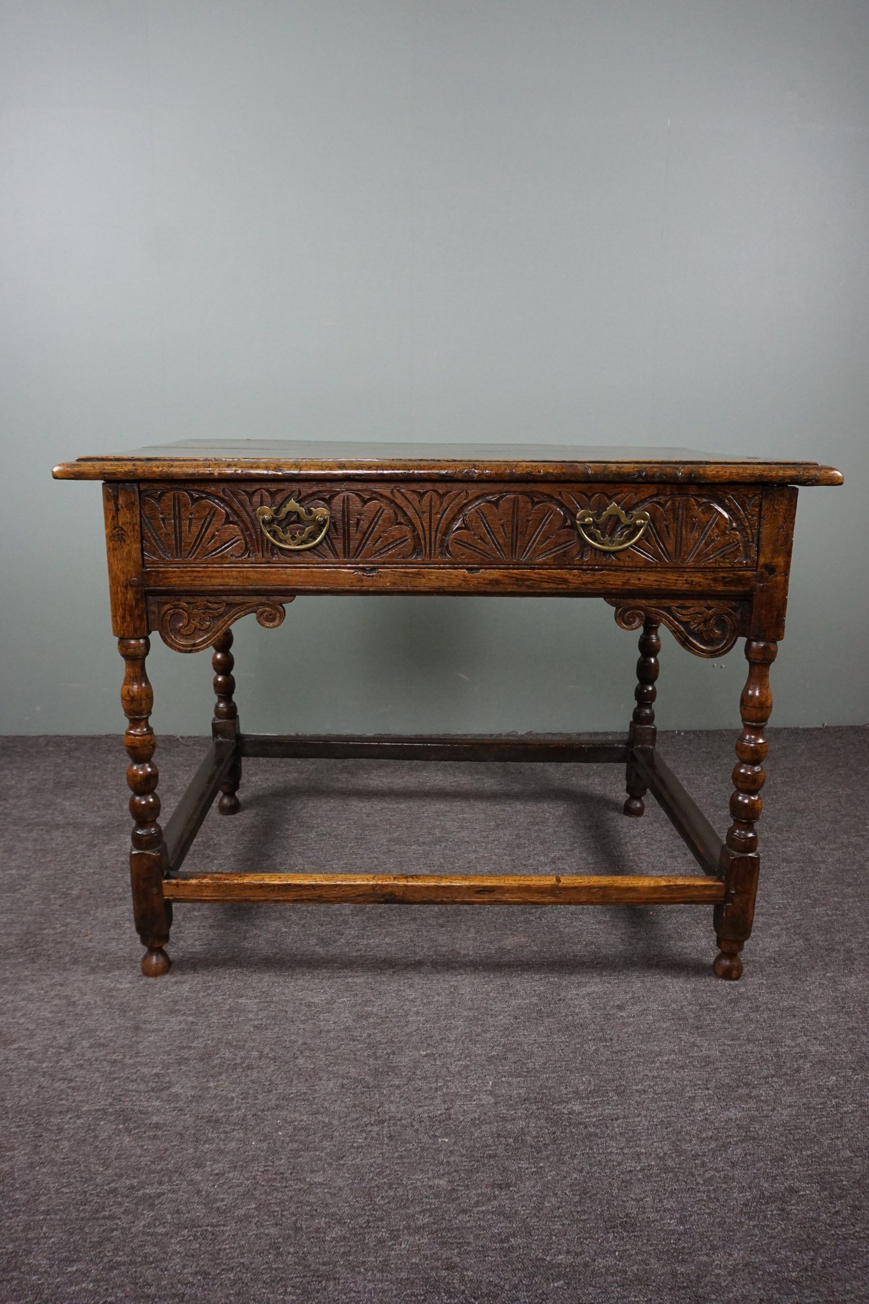 Carved antique English side table