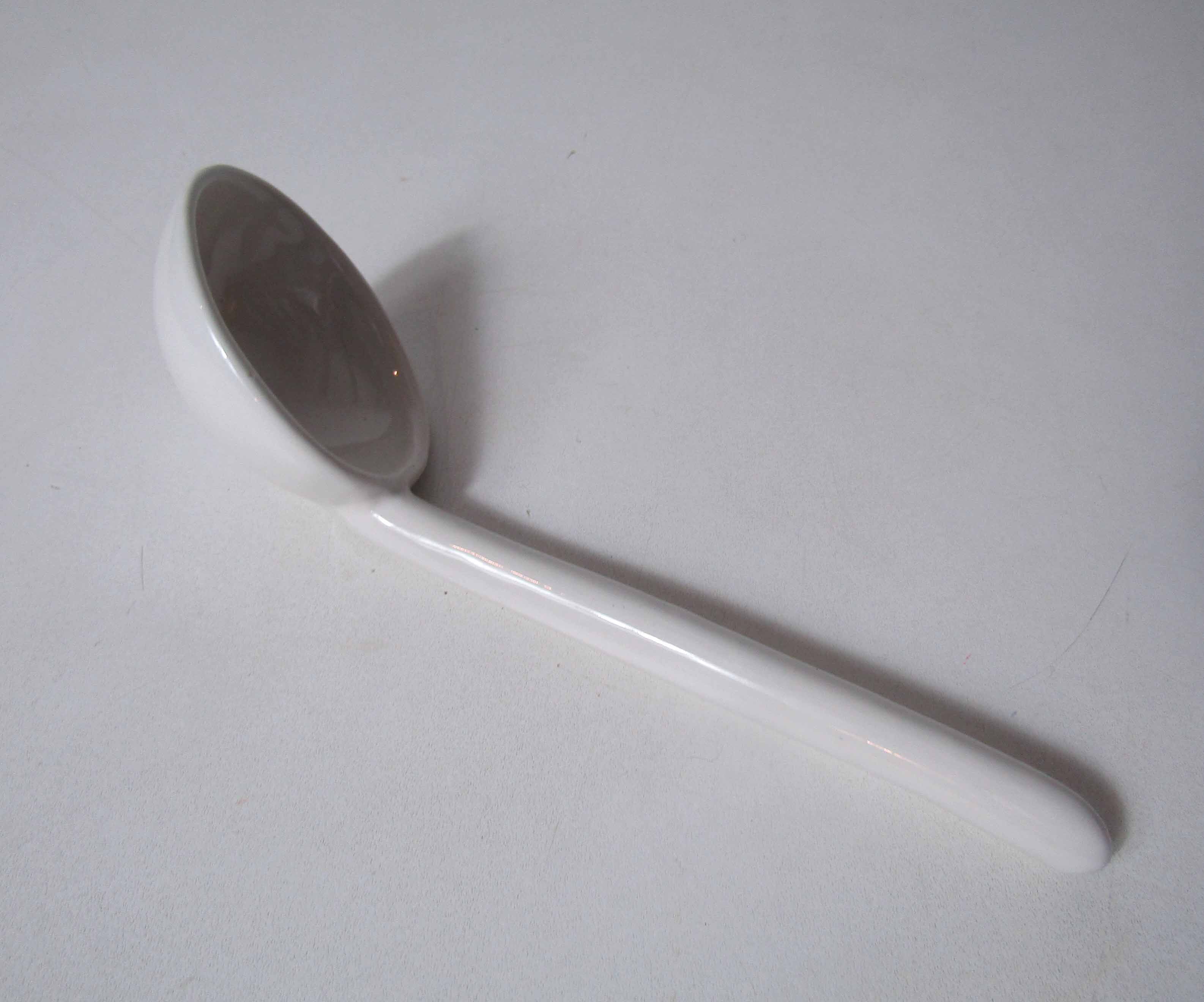 Ladle in white ceramic