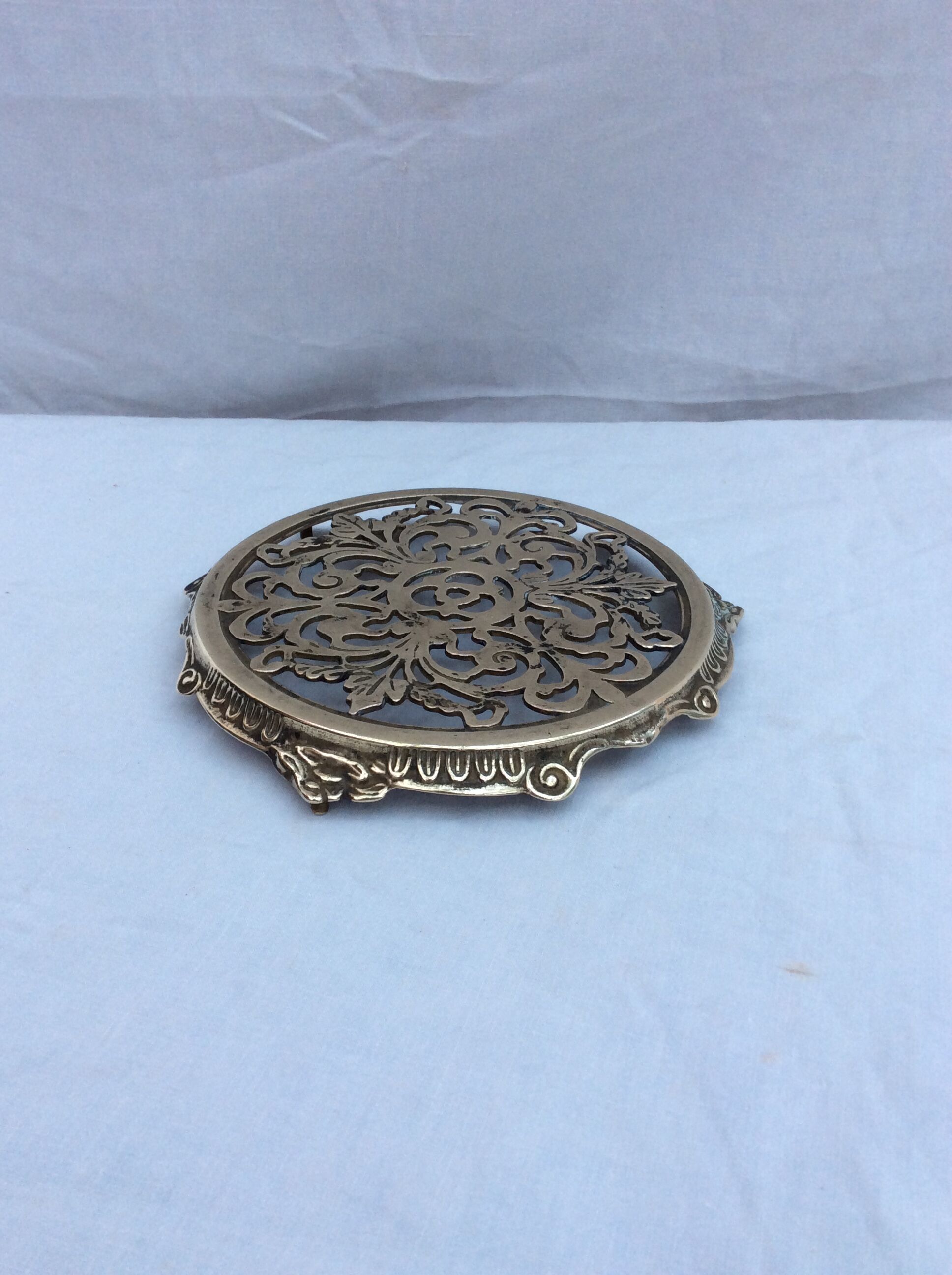 Round flat in vintage brass