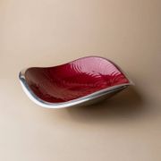 Red enameled steel bowl with textured interior and silver exterior; vintage Italian 1970s design